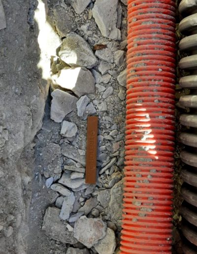 Placement of a Trenchip sensor in a water pipe trench parallel to a Low Voltage line, guaranteeing the location and information of the installation in the future.